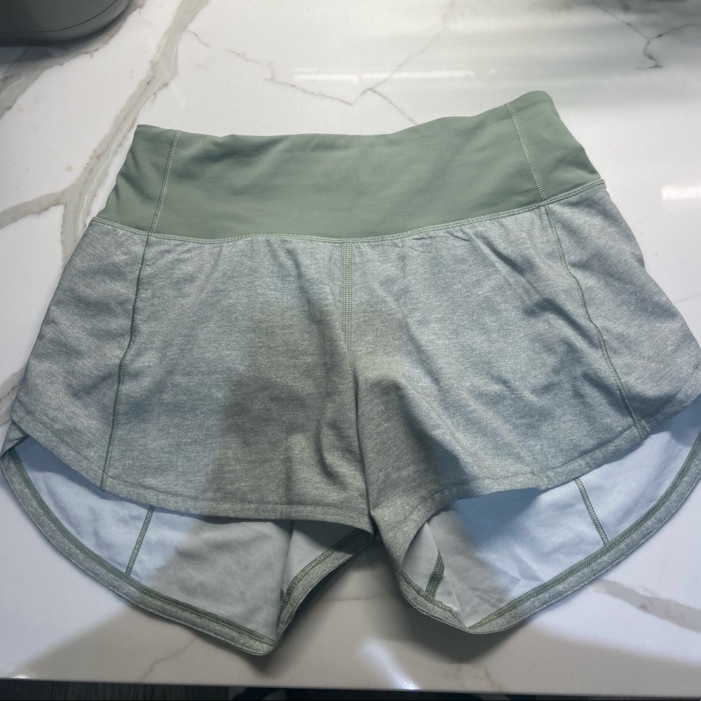 green lululemon shorts